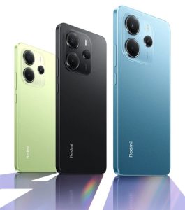 Redmi Note 14 के तीन रंगों – मिडनाइट ब्लैक, आइस ब्लू और सनराइज गोल्ड – में उपलब्ध स्टाइलिश डिजाइन वाला स्मार्टफोन, जो प्रीमियम लुक और दमदार फीचर्स के साथ दिखाया गया है।